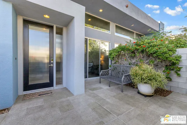 a view of a entryway door front of house