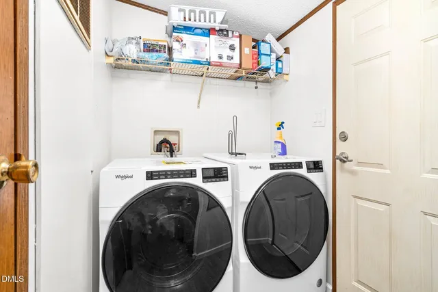 a view of a livingroom with wooden floor