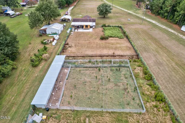 a view of a yard with an outdoor space