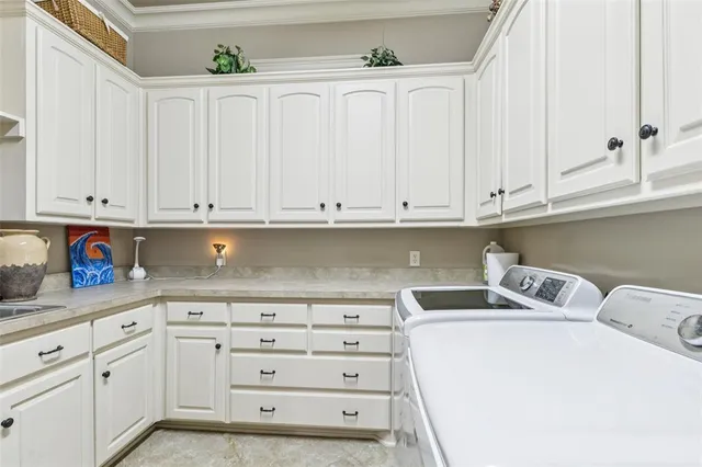 a kitchen with granite countertop stainless steel appliances and wooden cabinets