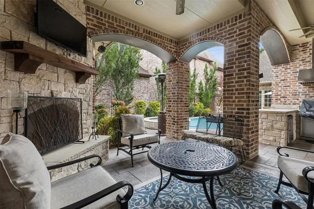 a kitchen with a stove and a sink