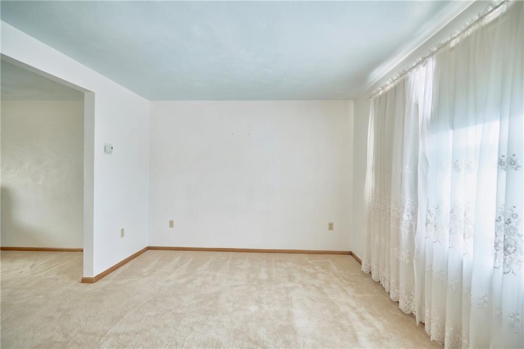 151 Stone Quarry Road Aliquippa, PA 15001 - Photo 12 of 26 Diningroom looking toward the family room