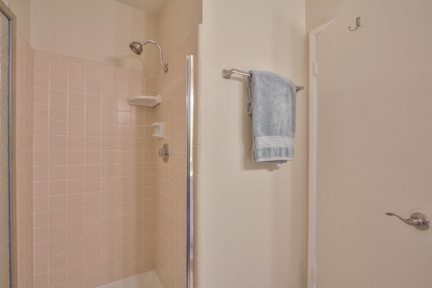 4000 Rio Road, Unit 26 Carmel, CA 93923 - Photo 21 of 27 a bathroom with a shower