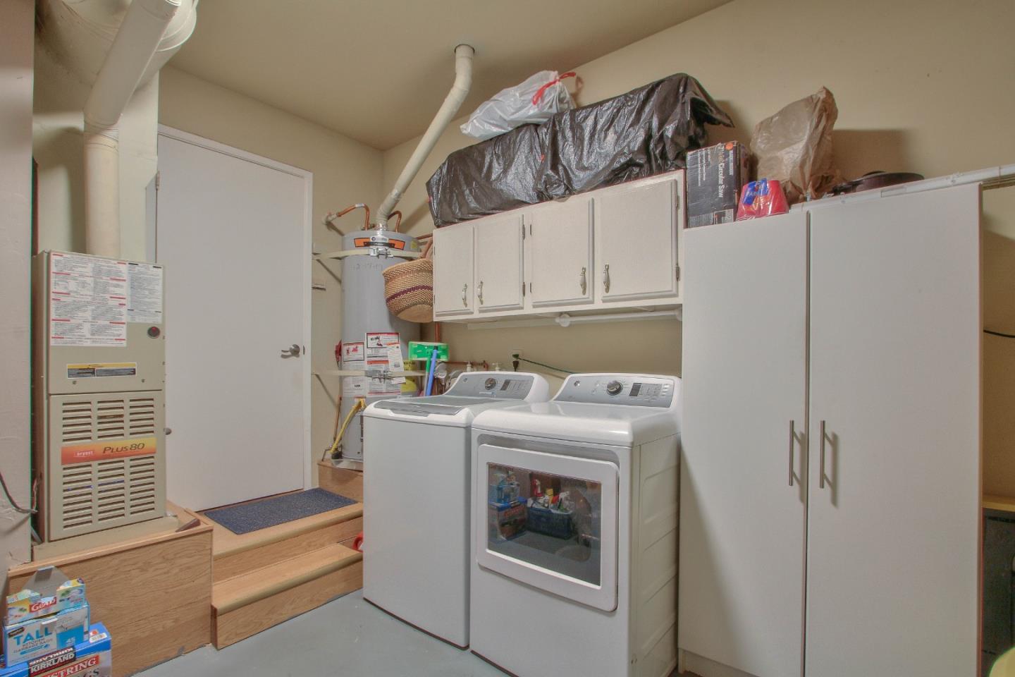 4000 Rio Road, Unit 26 Carmel, CA 93923 - Photo 22 of 27 a utility room with dryer and washer