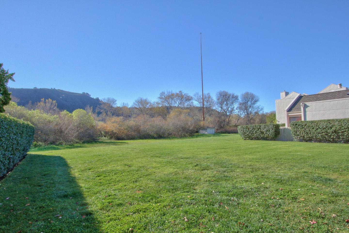 4000 Rio Road, Unit 26 Carmel, CA 93923 - Photo 26 of 27 a view of an outdoor space and a yard