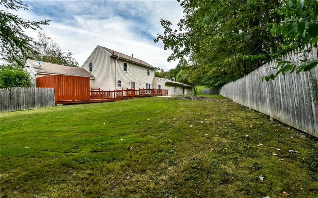1064 Freedom Crider Road Freedom, PA 15042 - Photo 4 of 25 Back of property showing deck and fence.