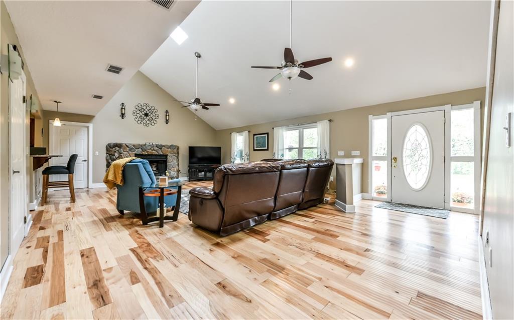 1064 Freedom Crider Road Freedom, PA 15042 - Photo 10 of 25 Family room from stairs notice new Hickory flooring.