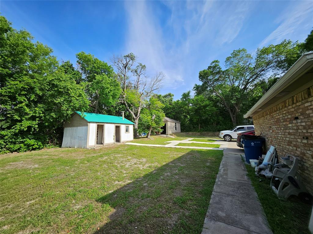 234 East Fork Road Sunnyvale, TX 75182 - Photo 20 of 32 a view of a house with a yard