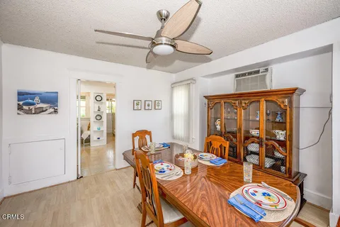 a kitchen that has a sink and a stove