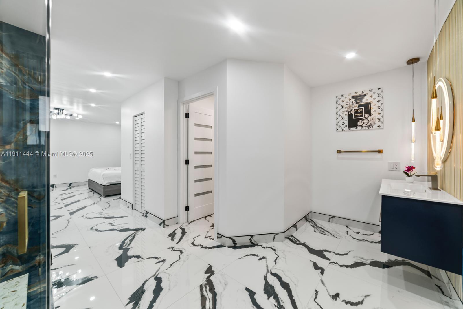 14242 Southwest 30th Street Miami, FL 33175 - Photo 23 of 45 a bedroom with a bed and a window