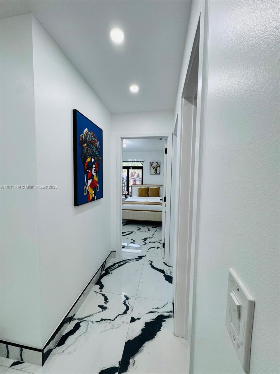 14242 Southwest 30th Street Miami, FL 33175 - Photo 29 of 45 a bathroom with a sink and a shower