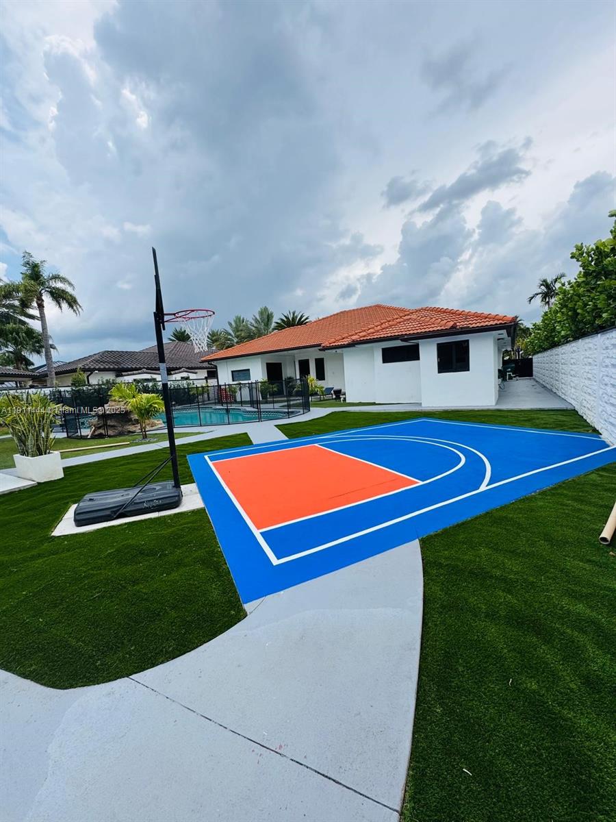 14242 Southwest 30th Street Miami, FL 33175 - Photo 36 of 45 a front view of house with yard