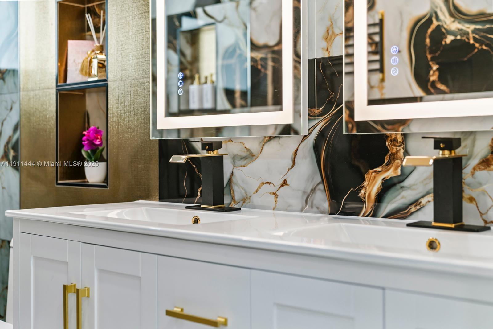14242 Southwest 30th Street Miami, FL 33175 - Photo 42 of 45 a bathroom with a sink and a mirror
