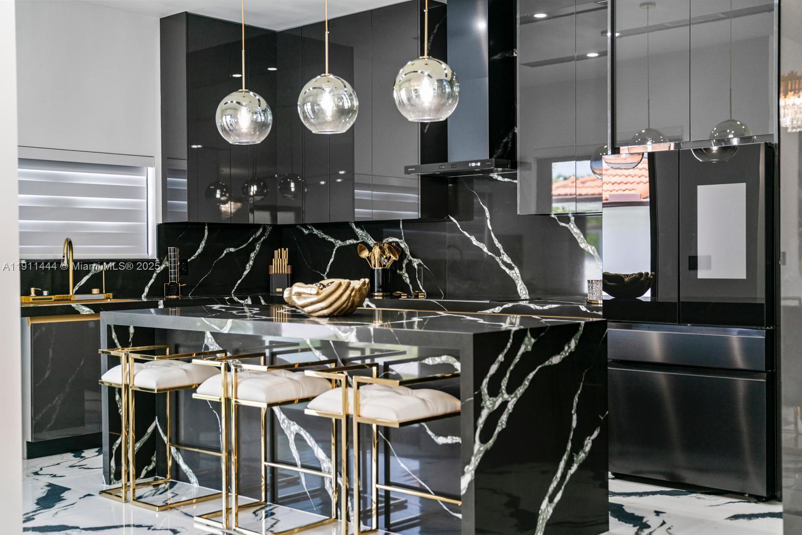 14242 Southwest 30th Street Miami, FL 33175 - Photo 9 of 45 a kitchen with a table and chairs