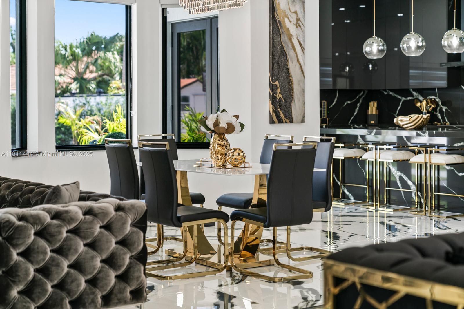 14242 Southwest 30th Street Miami, FL 33175 - Photo 10 of 45 a view of a dining room with furniture and chandelier