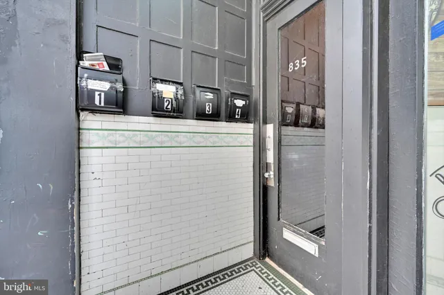 a view of entryway with wooden floor