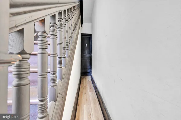 a view of a car park in front of house