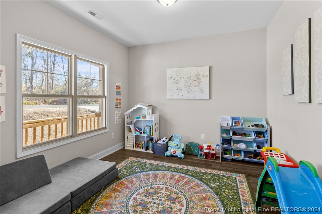 740 Walker Road Bunnlevel, NC 28323 - Photo 2 of 27 a very nice looking room with a large window