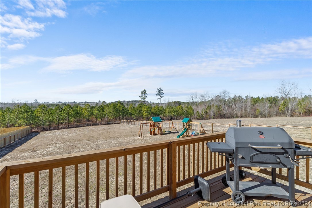 740 Walker Road Bunnlevel, NC 28323 - Photo 25 of 27 a view of city from a balcony