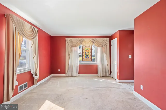 an empty room with a window