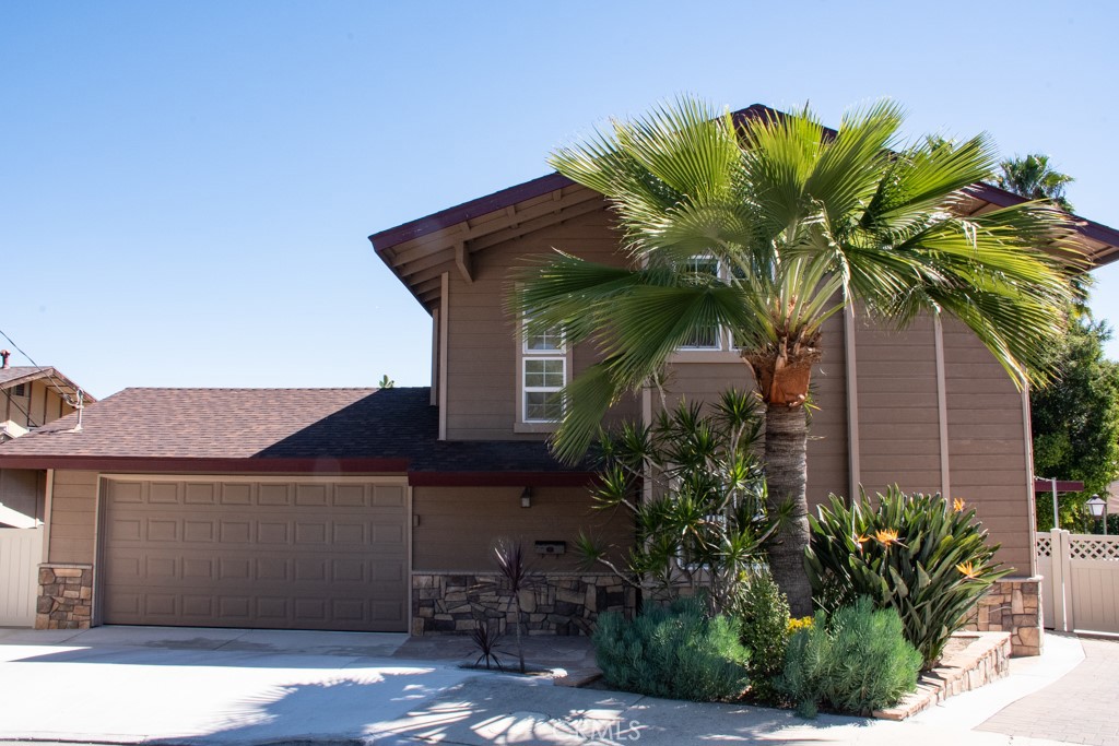 933 Eastside Road El Cajon, CA 92020 - Photo 3 of 70 a plant that is sitting in front of a house