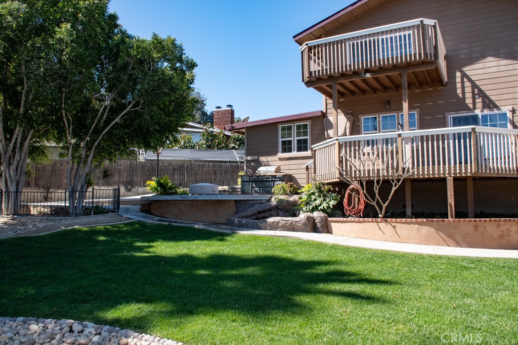 933 Eastside Road El Cajon, CA 92020 - Photo 34 of 70 a view of a house with a backyard porch and sitting area