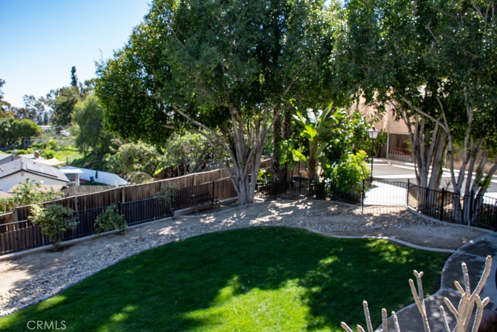 933 Eastside Road El Cajon, CA 92020 - Photo 41 of 70 a view of a backyard with plants and a patio
