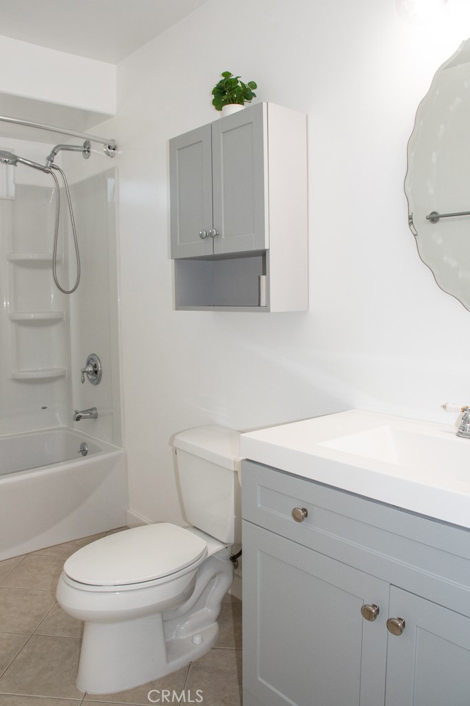 933 Eastside Road El Cajon, CA 92020 - Photo 47 of 70 a bathroom with a sink a toilet and shower