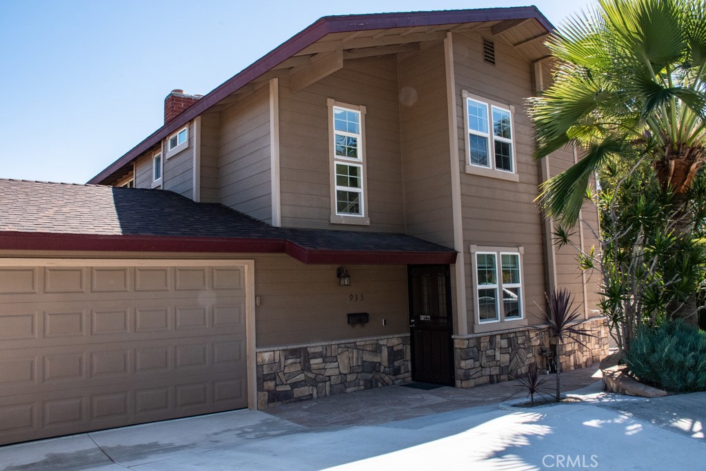 933 Eastside Road El Cajon, CA 92020 - Photo 5 of 70 a front view of a house with garden