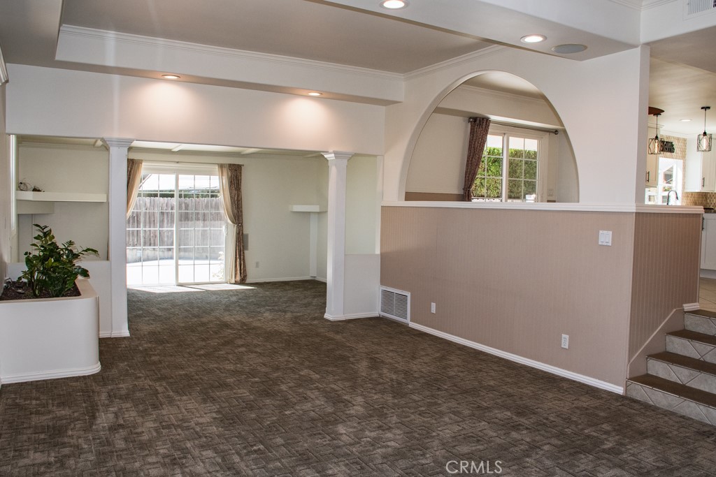 933 Eastside Road El Cajon, CA 92020 - Photo 9 of 70 an empty room with windows and entrance