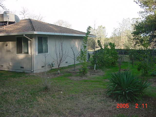 1760 Canyon Road Redding, CA 96001 - Photo 7 of 10 Corner of yard with orchard