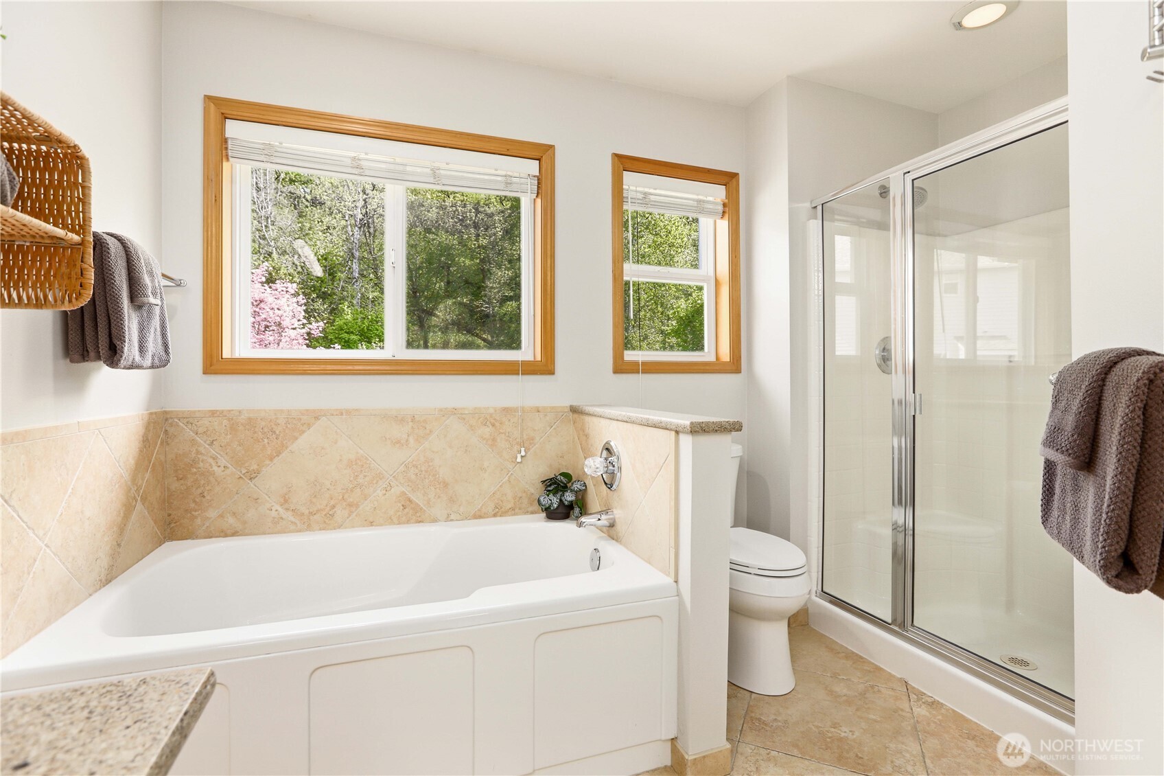 23327 8th Place West Bothell, WA 98021 - Photo 21 of 40 a white bath tub sitting next to a white toilet