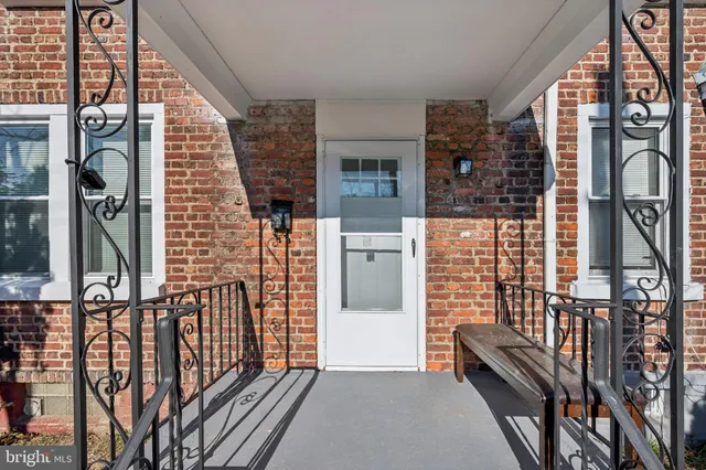 a view of front door of house and stairs
