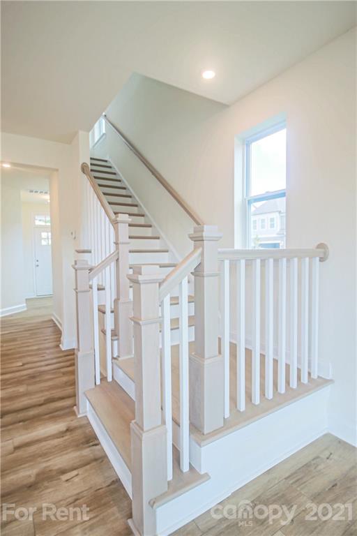 3005 Patchwork Court Fort Mill, SC 29708 - Photo 12 of 38 a view of a hallway with wooden floor and entryway