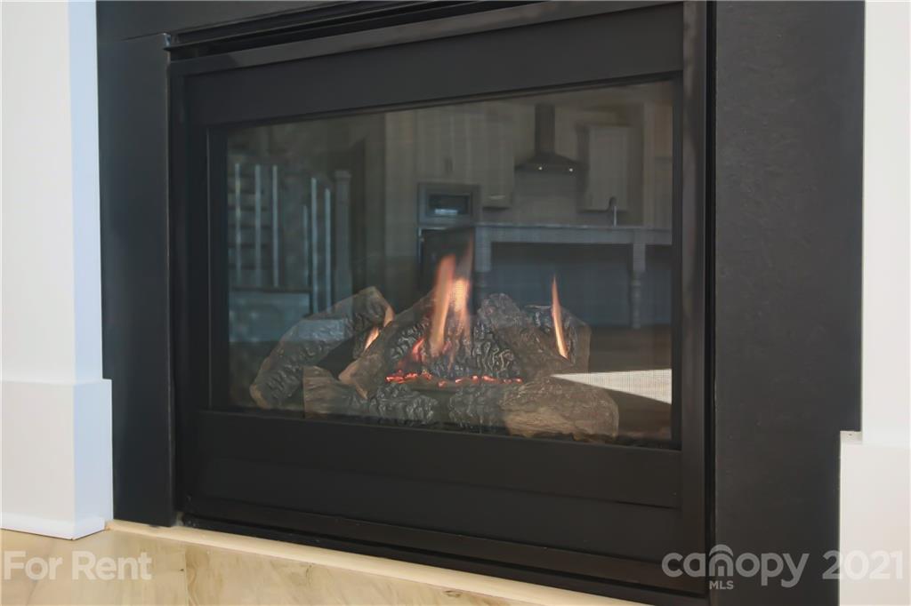 3005 Patchwork Court Fort Mill, SC 29708 - Photo 15 of 38 a room with water heater and wooden cabinets