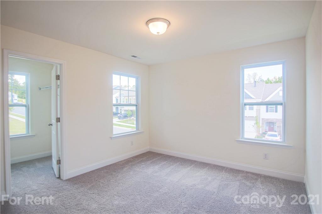 3005 Patchwork Court Fort Mill, SC 29708 - Photo 29 of 38 an empty room with windows and closet