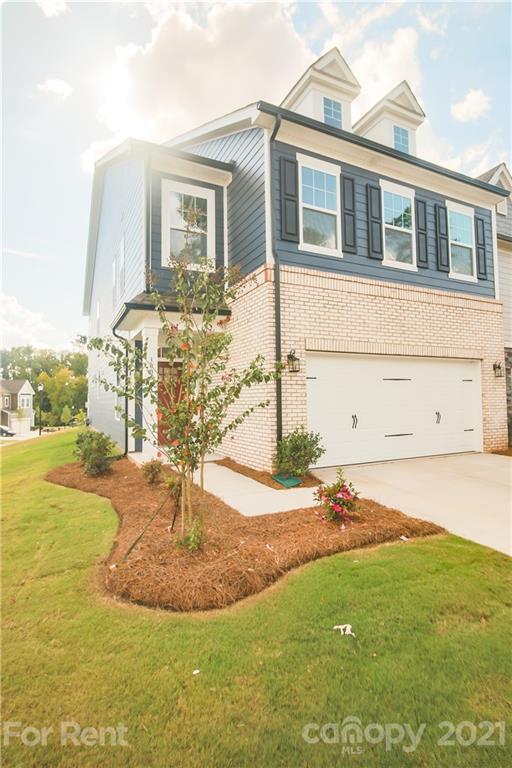 3005 Patchwork Court Fort Mill, SC 29708 - Photo 4 of 38 a front view of a house with a yard
