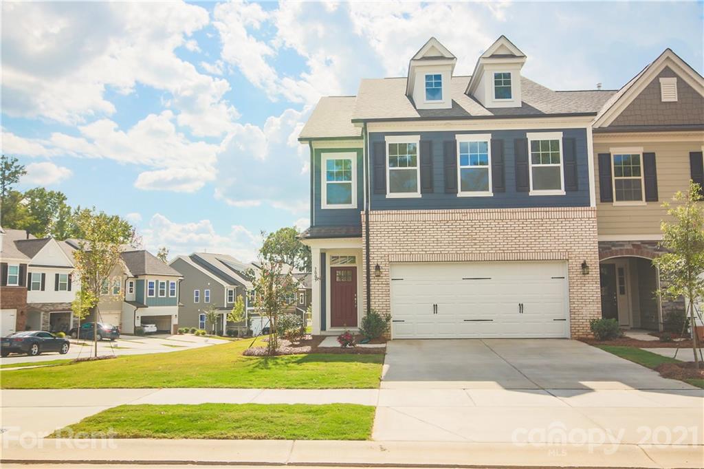 3005 Patchwork Court Fort Mill, SC 29708 - Photo 7 of 38 a front view of a building with a garden and trees