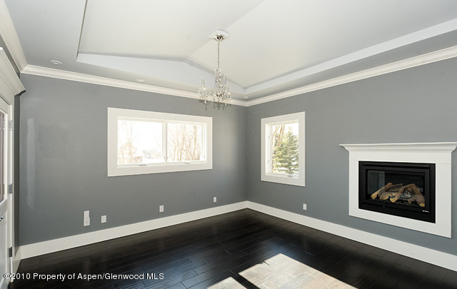 277 Willits Lane Basalt, CO 81621 - Photo 13 of 22 a view of an empty room with window and fire place