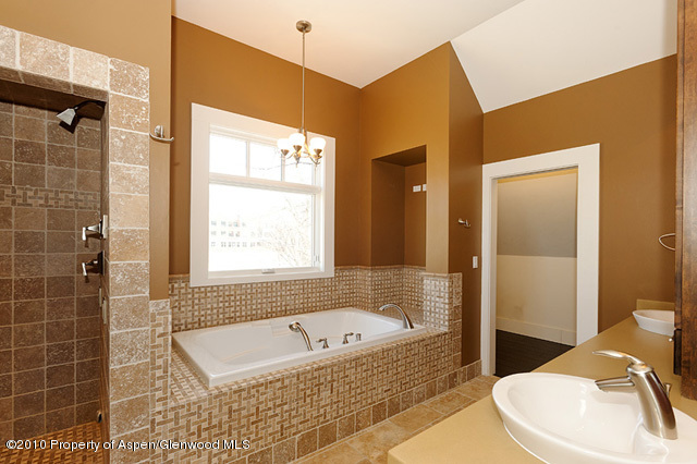 277 Willits Lane Basalt, CO 81621 - Photo 21 of 22 a bathroom with a tub a sink and a shower