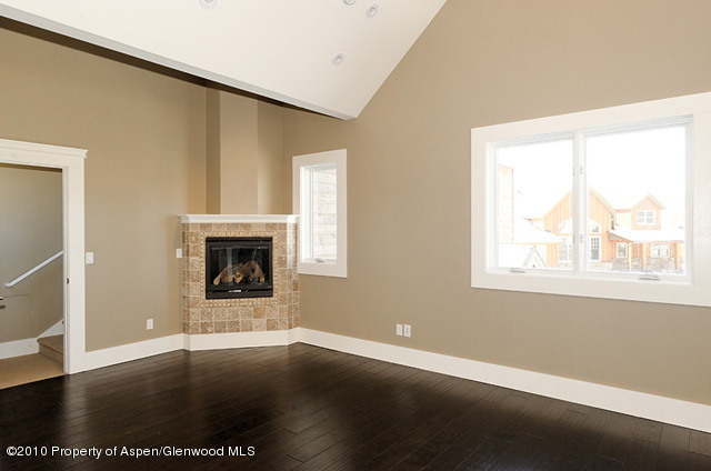277 Willits Lane Basalt, CO 81621 - Photo 22 of 22 a view of an empty room with wooden floor and a window