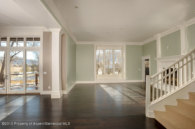 277 Willits Lane Basalt, CO 81621 - Photo 6 of 22 a view of an empty room with wooden floor and a window