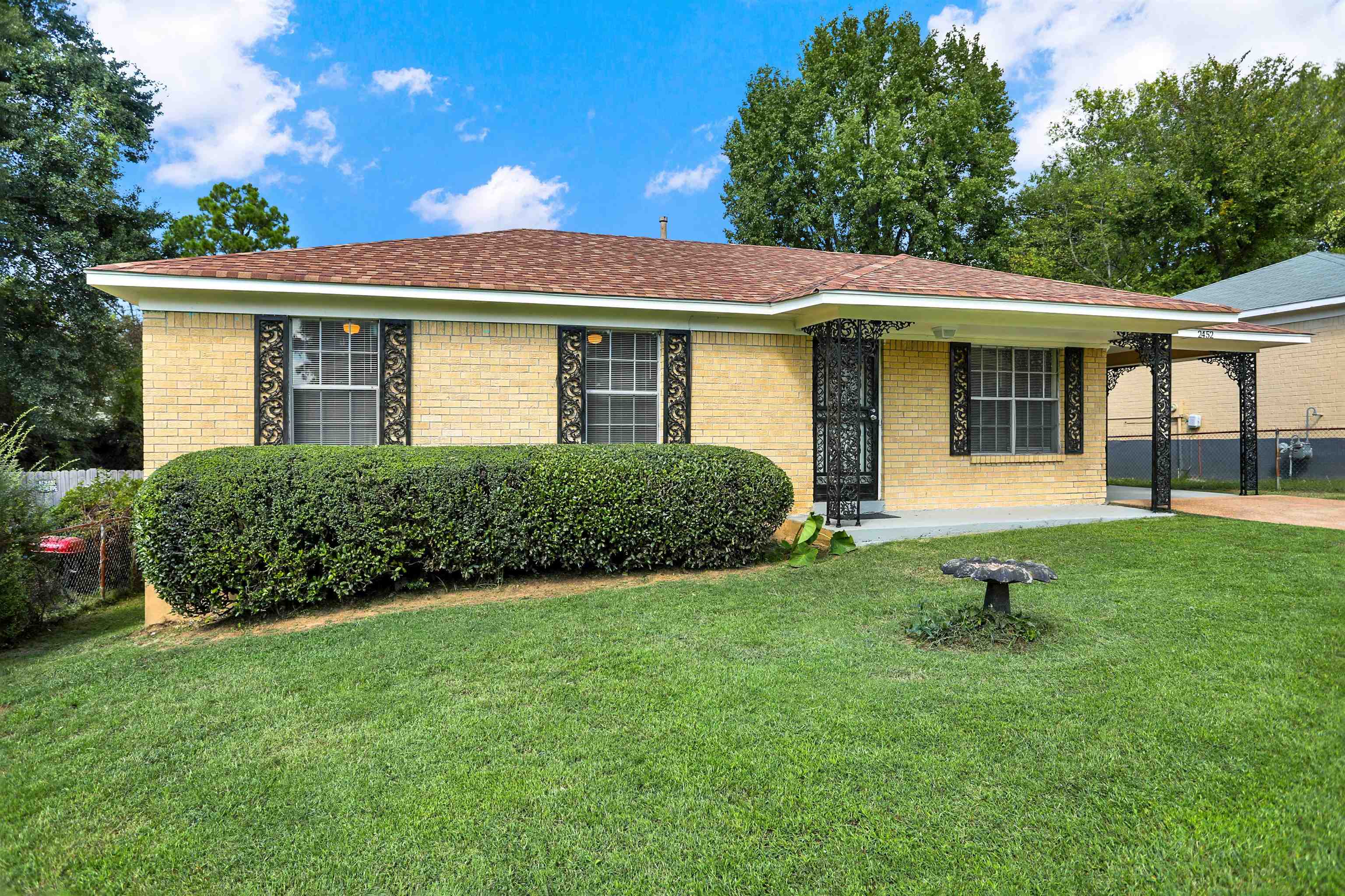 2452 Chattering Lane Memphis, TN 38127 - Photo 3 of 13 Single story home with a front lawn