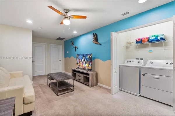 a living room with furniture and a table