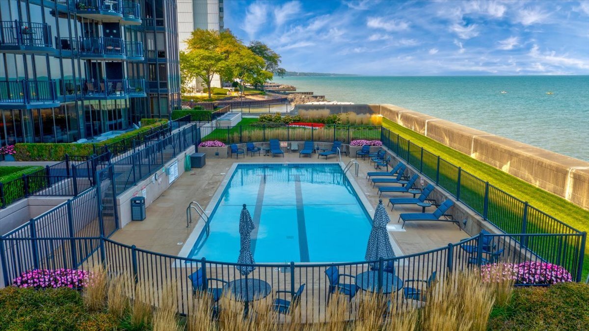 1420 Sheridan Road, Unit 1H Wilmette, IL 60091 - Photo 36 of 40 a view of balcony with wooden floor and outdoor seating