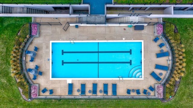 a view of a big room with table and chairs