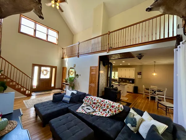 a bedroom with bed and a window