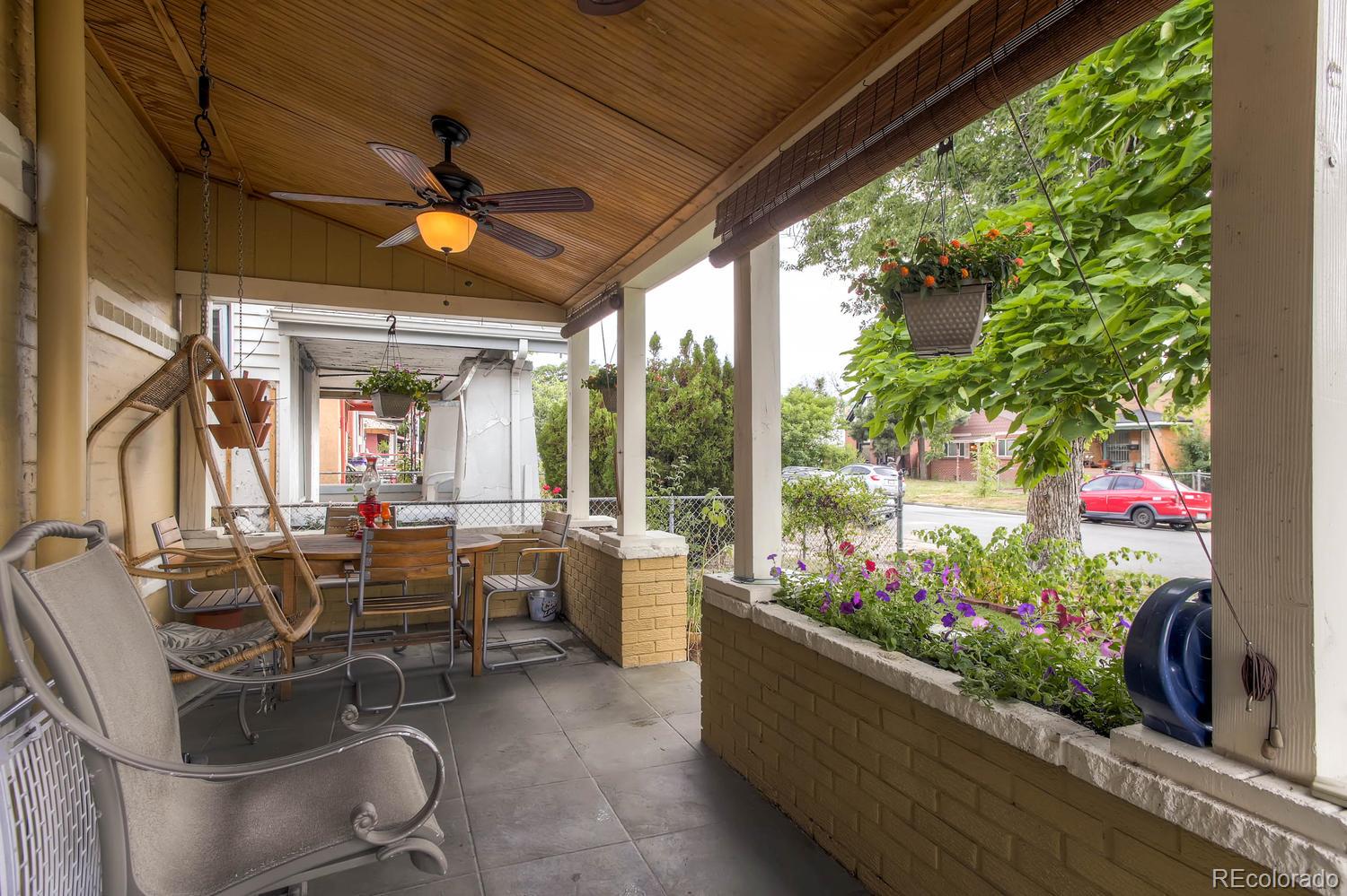 272 Inca Street Denver, CO 80223 - Photo 3 of 28 a view of a dining room with furniture window and outside view