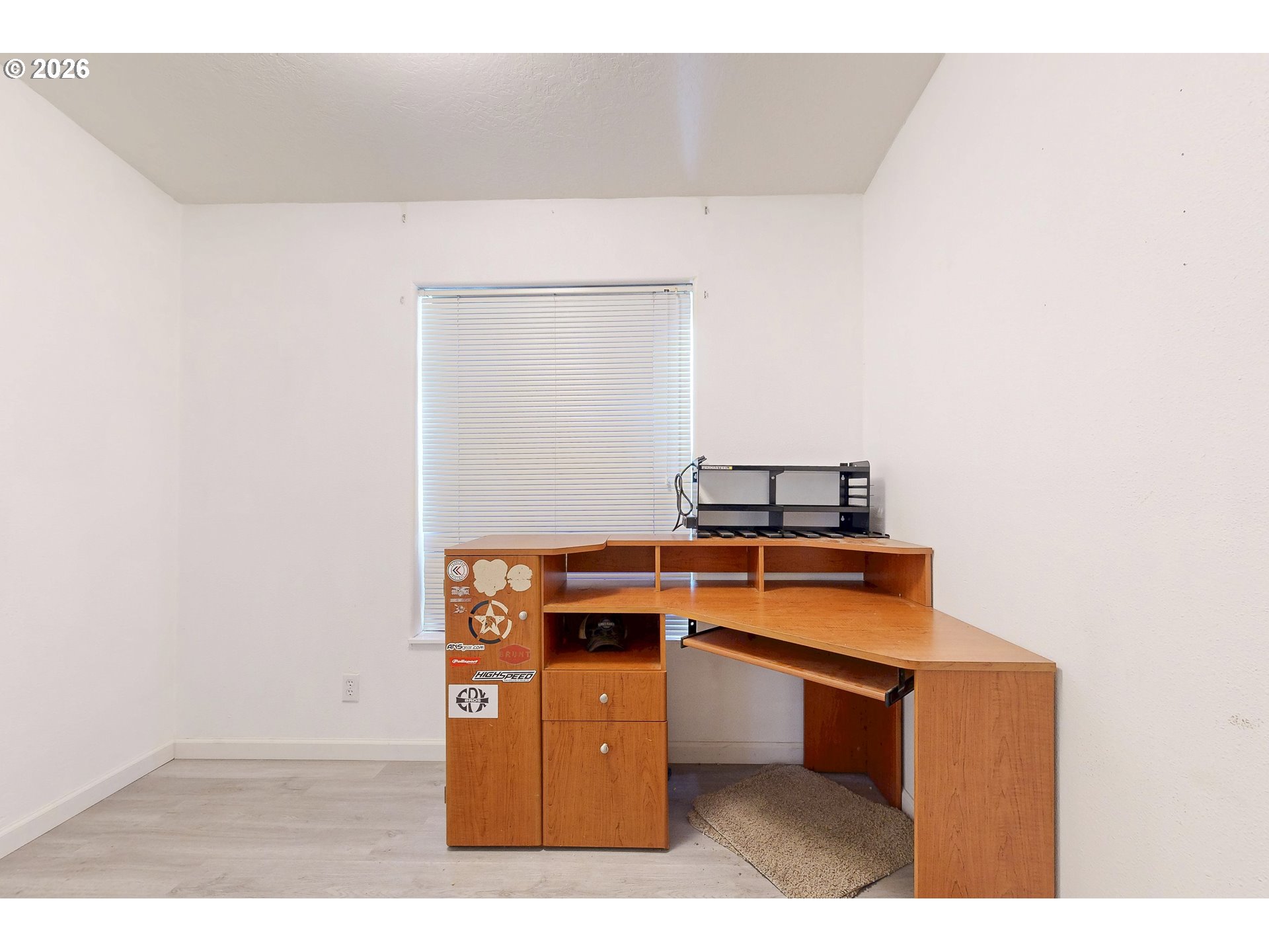 84889 Triangle Station Road Milton Freewater, OR 97862 - Photo 21 of 40 a room with wooden floor
