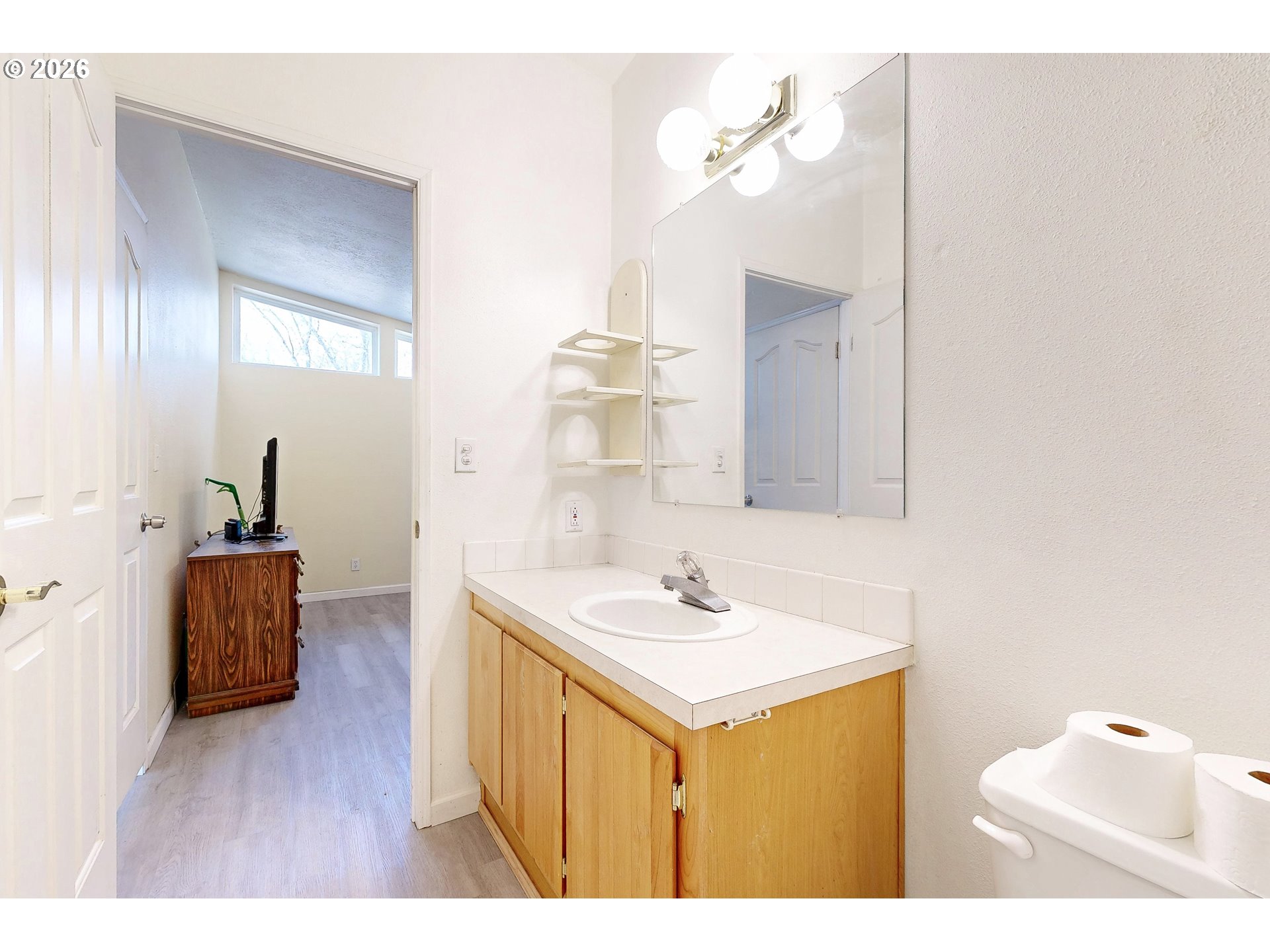 84889 Triangle Station Road Milton Freewater, OR 97862 - Photo 26 of 40 a bathroom with a sink a tub and a mirror